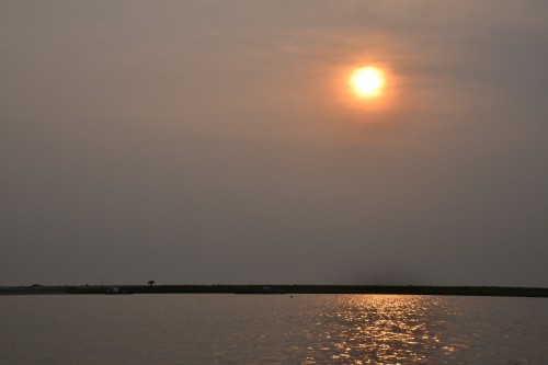 The stunning sunset at the shores of the majestic Padma river