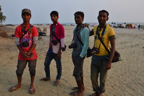 Some of the Kuakata beach photographers pose for a picture themselves.