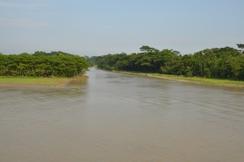 A view of the opening of the canal where it joins the main river, after miles of snaking through the villages. 