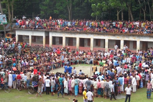 Hundreds of villagers cramp into every available space before the start of the hadudu game at the Goshontara village.