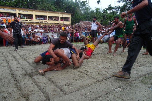 A raider is tacked with great tenacity in the court at the hadudu game organised at the Goshontara village recently