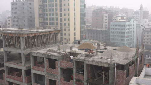 An under-construction apartment building in the city