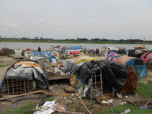 Kamal's boat shaped home on the banks of the Dhaleshwari river