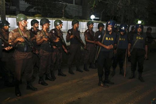 Different law enforcement forces line the road in Gulshan on the night of 1st July, 2016